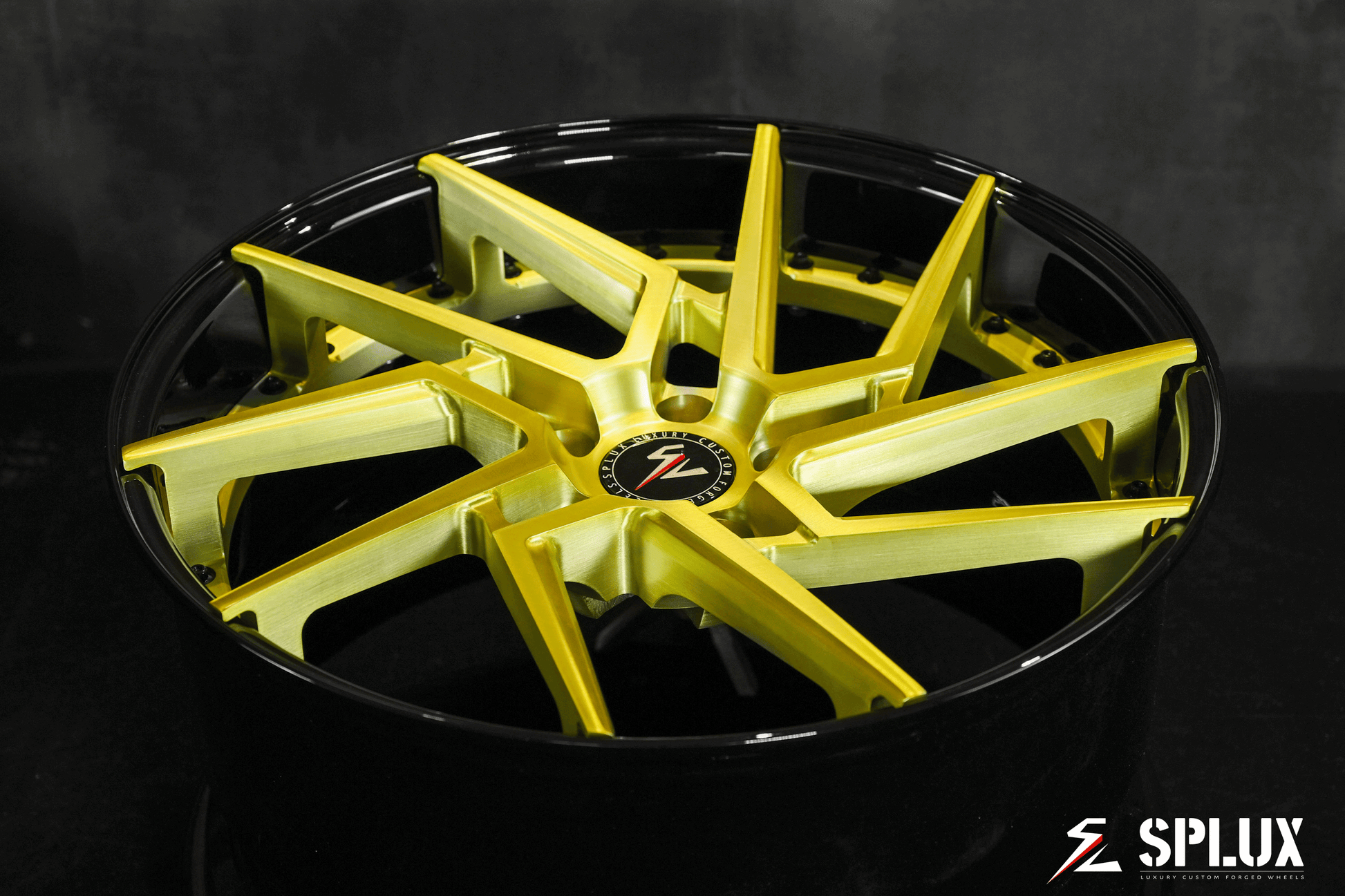 Close-up of 19 inch brushed gold wheels with floating spokes on 2020 Corvette C8 Z51, highlighting super concave shape.